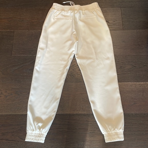 Off white dress slacks, modern look with elastic/drawstring waist and cuffs. XS - Picture 2 of 6